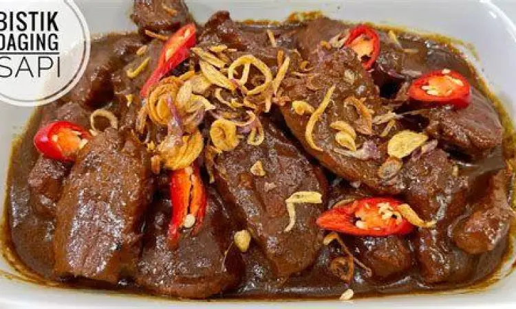 Proses marinasi daging sapi dengan bumbu rempah