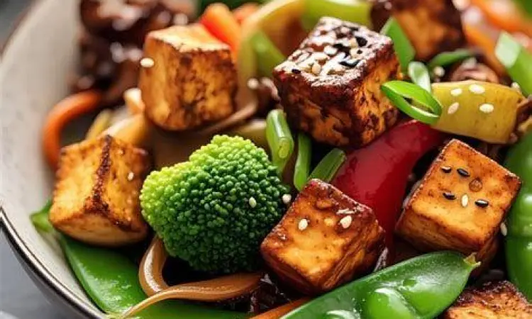 Tumis sayuran dan tahu sebagai menu makan malam vegetarian