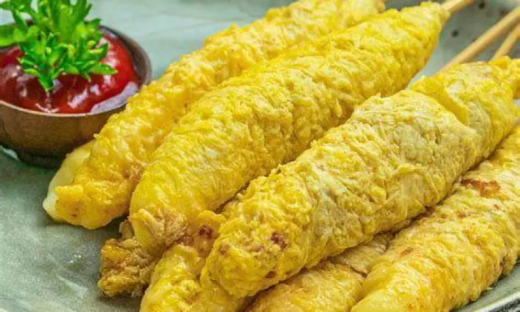 Gambar telur gulung mozzarella dengan efek keju meleleh