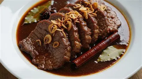 Menumis Bumbu Lapis Proses menumis bumbu halus untuk daging lapis