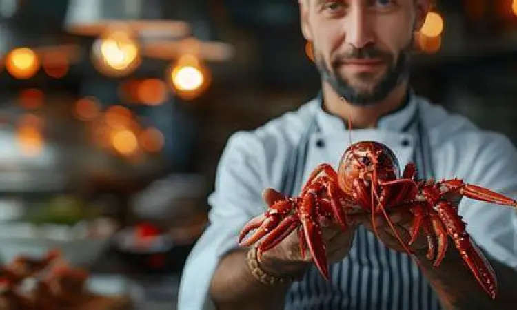 Proses Pengolahan Seafood Koki memasak seafood dengan teknik profesional