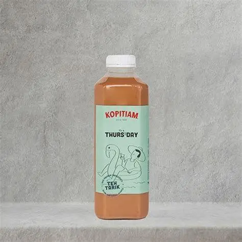 Teknik Tarik Tradisional Proses pembuatan teh tarik di kedai kopi