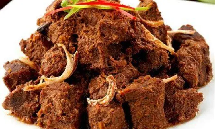 Proses memasak rendang daging sapi